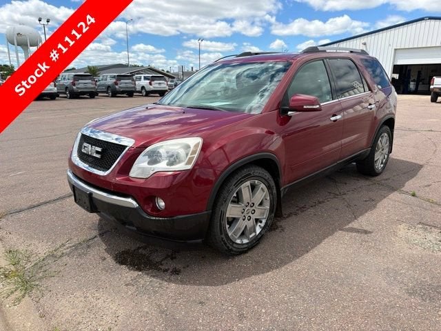 2010 GMC Acadia SLT2 in Red Jewel Tintcoat — front three-quarter view