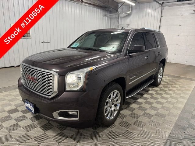 2015 GMC Yukon Denali in Midnight Amethyst Metallic — front three-quarter view