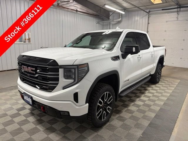 2026 GMC Sierra 1500 AT4 in Summit White — front three-quarter view