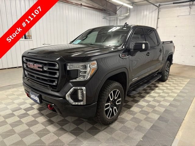 2020 GMC Sierra 1500 AT4 in Onyx Black — front three-quarter view