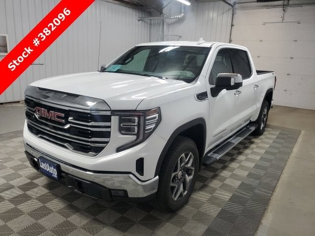 2026 GMC Sierra 1500 SLT in Summit White — front three-quarter view