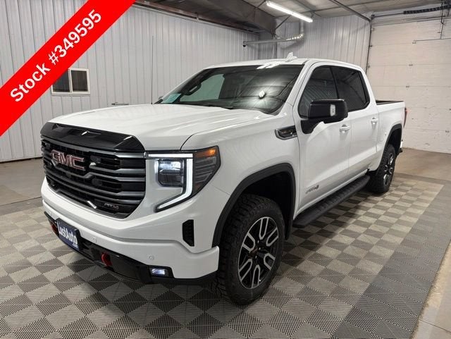 2026 GMC Sierra 1500 AT4 in Summit White — front three-quarter view